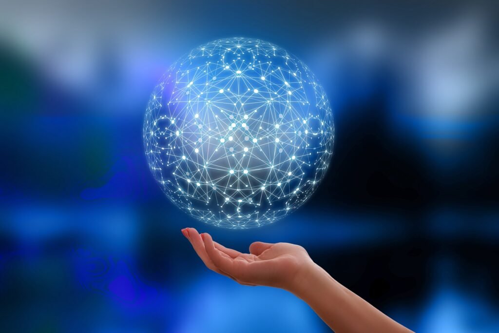 Illustration of a glowing connected global network held in a hand, symbolizing Red Leaf's enterprise IT consulting and digital connectivity services